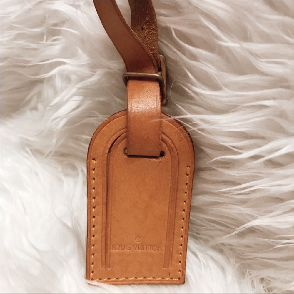 💯% Authentic Luggage tag